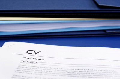 CV on a blue desk